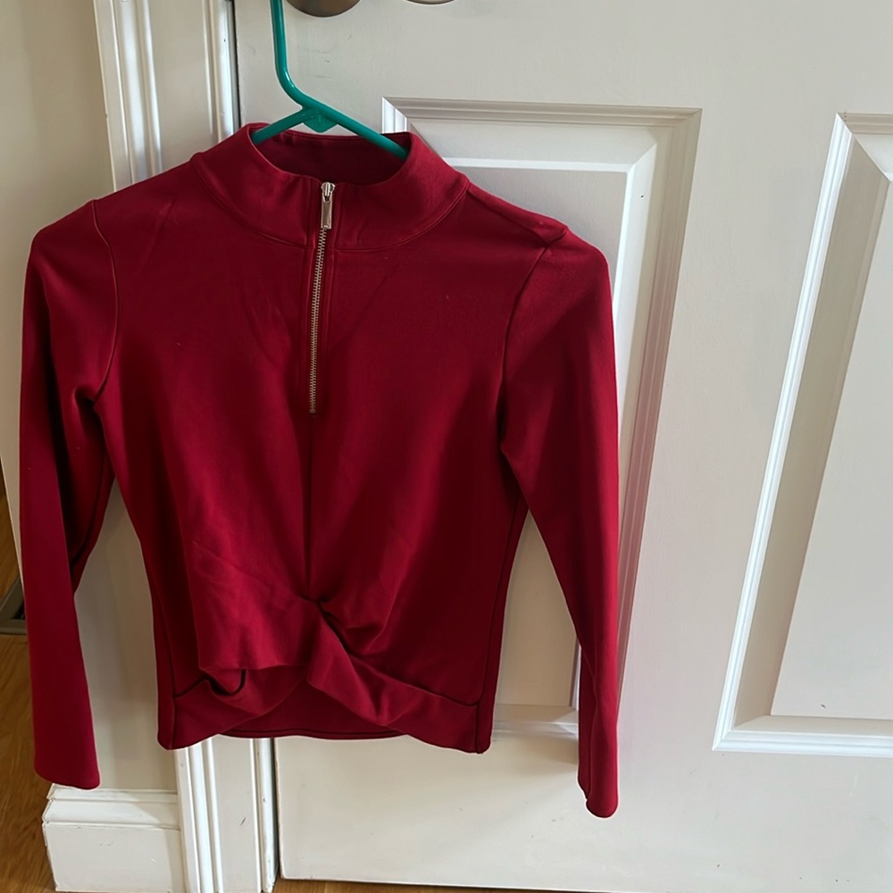 Karen Millen  Zip front red top US 6 . Red. Twisted bottom. Stretch. Long sleeve